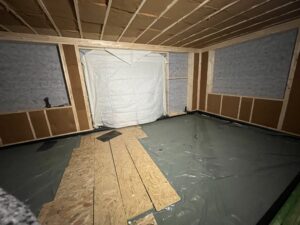 Placement d'un isolant au sol de la nouvelle extension